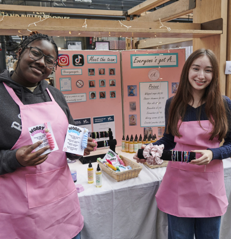 group of students at trade stand 