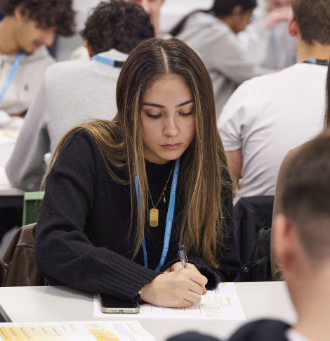 Young person in a classroom.