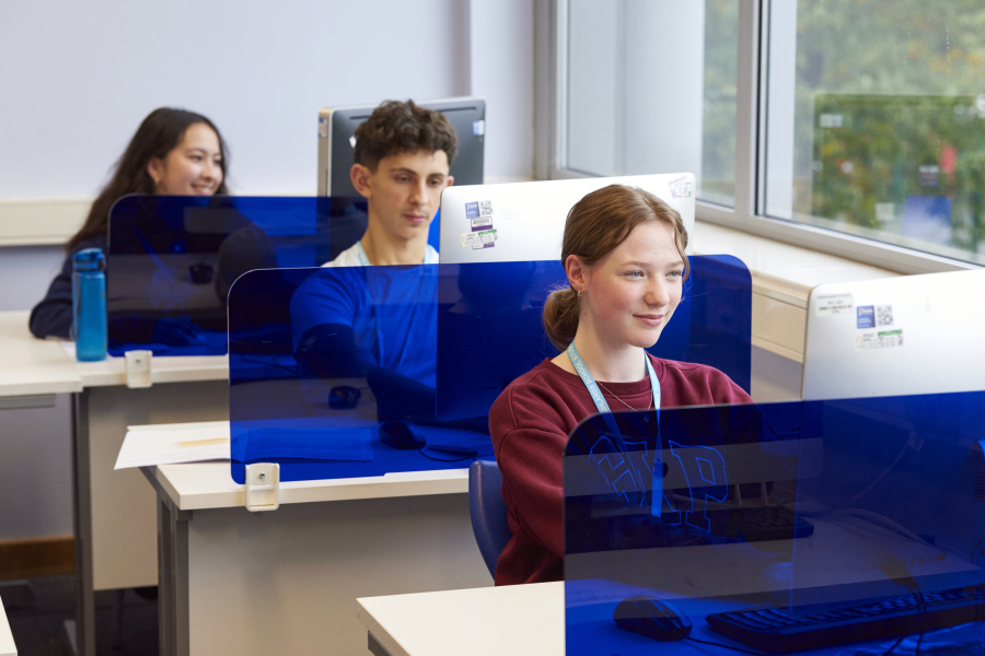 students looking at a computer