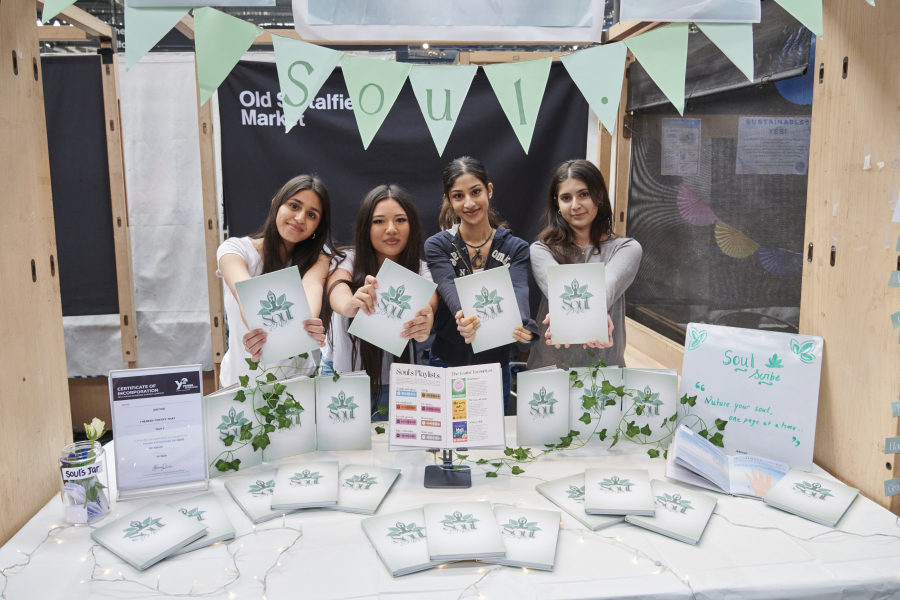 group of students at trade stand 