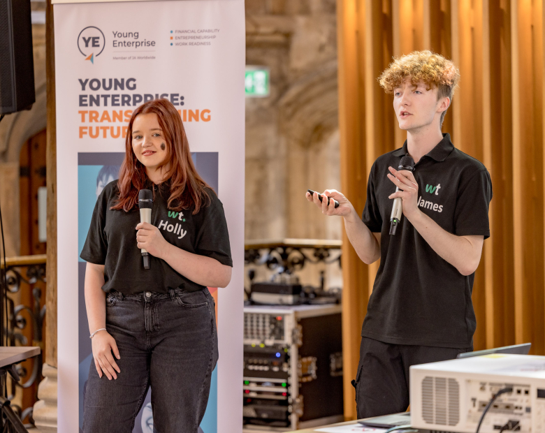 Two young people talking.