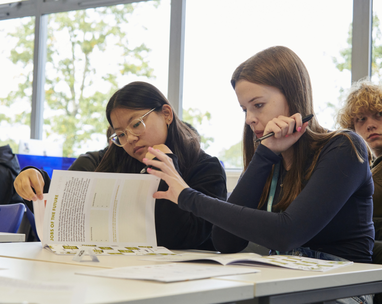 Young people in a classroom.