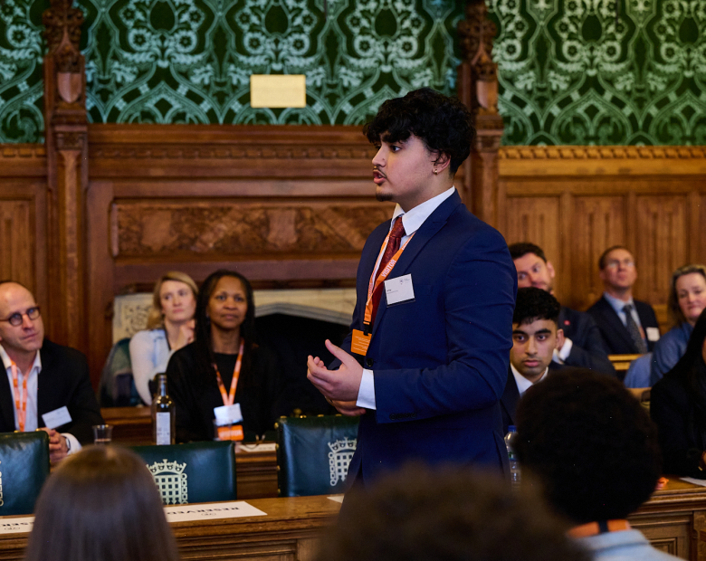 young man presenting in Parliament